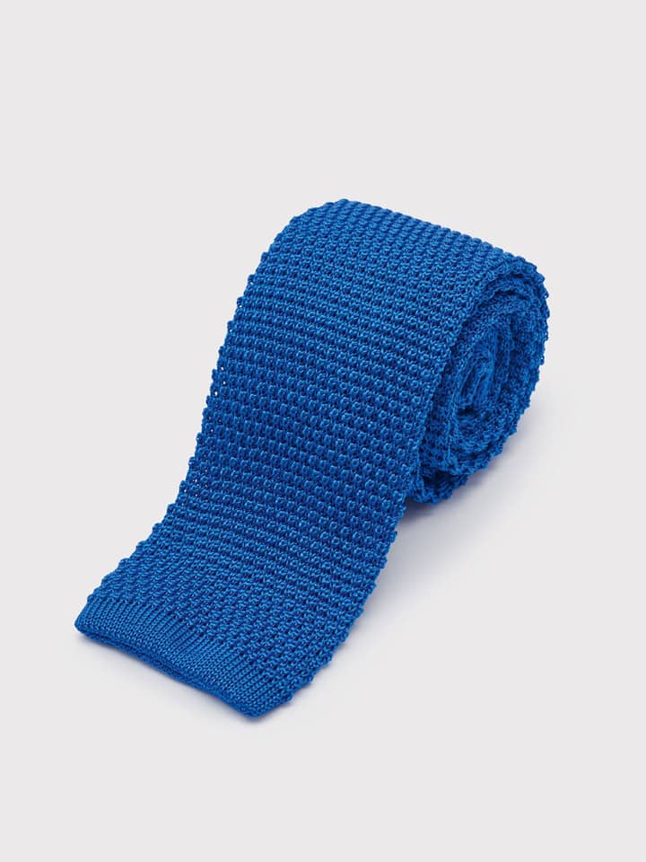 Knitted Silk Blue Tie Rolled up